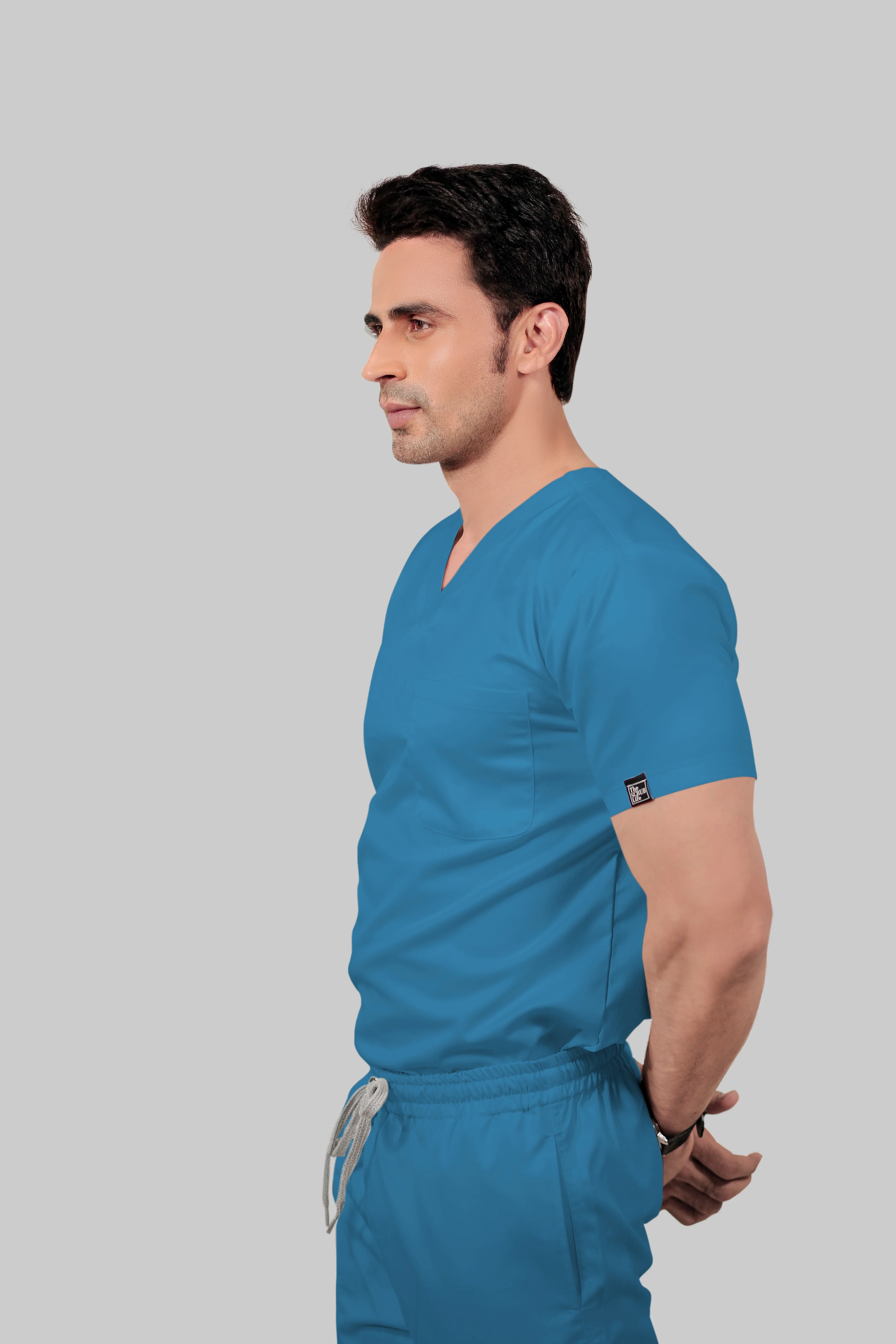 Stretchable (2Way) Men Peacock Blue V-Neck With Jogger Scrub Set - Image 3