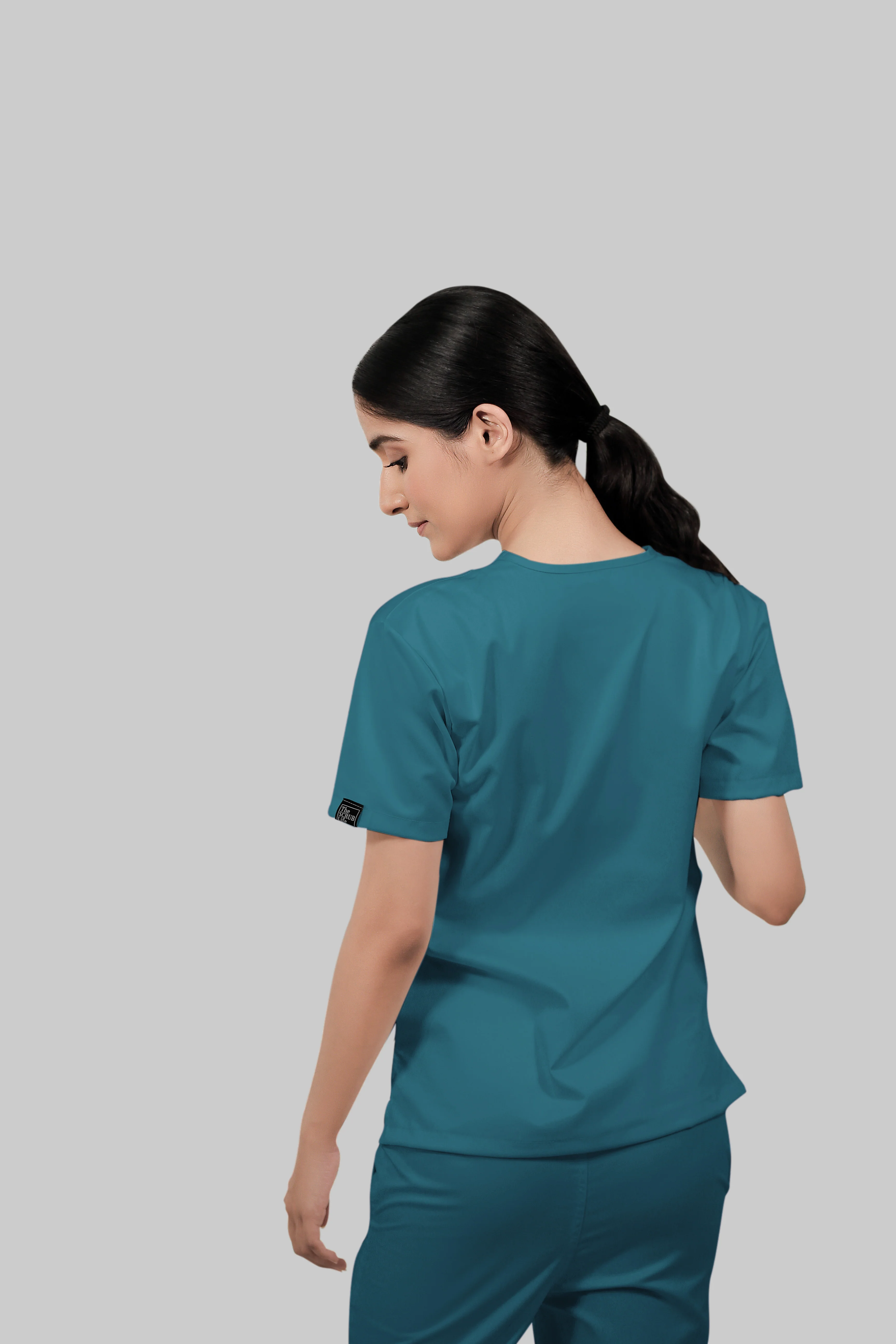 Stretchable (4way) Women Peacock Blue V-Neck With Straight Pant Scrub Set - Image 3