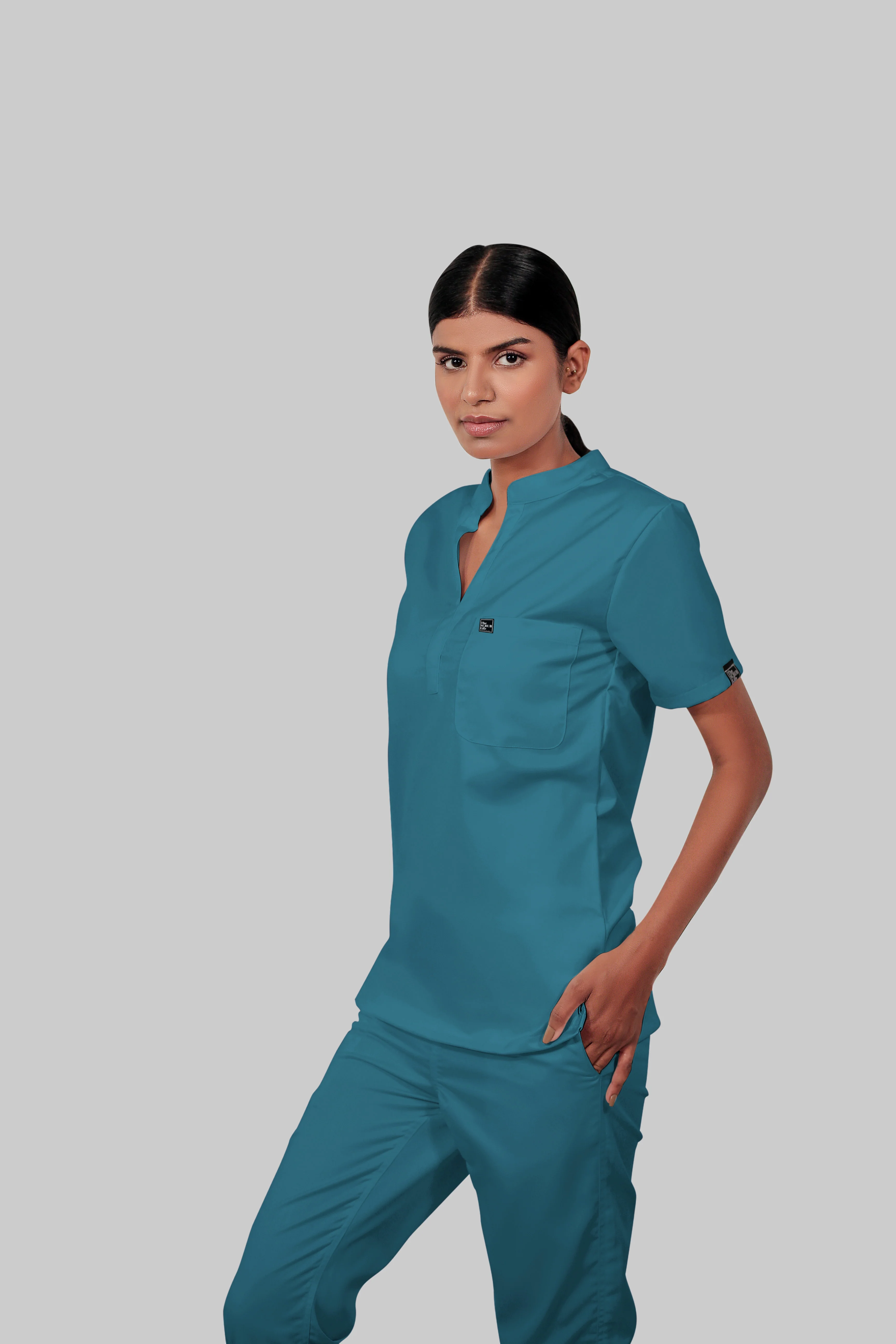 Stretchable (4Way) Women Peacock Blue Mandarin Neck With Straight Pant Scrub Set - Image 5