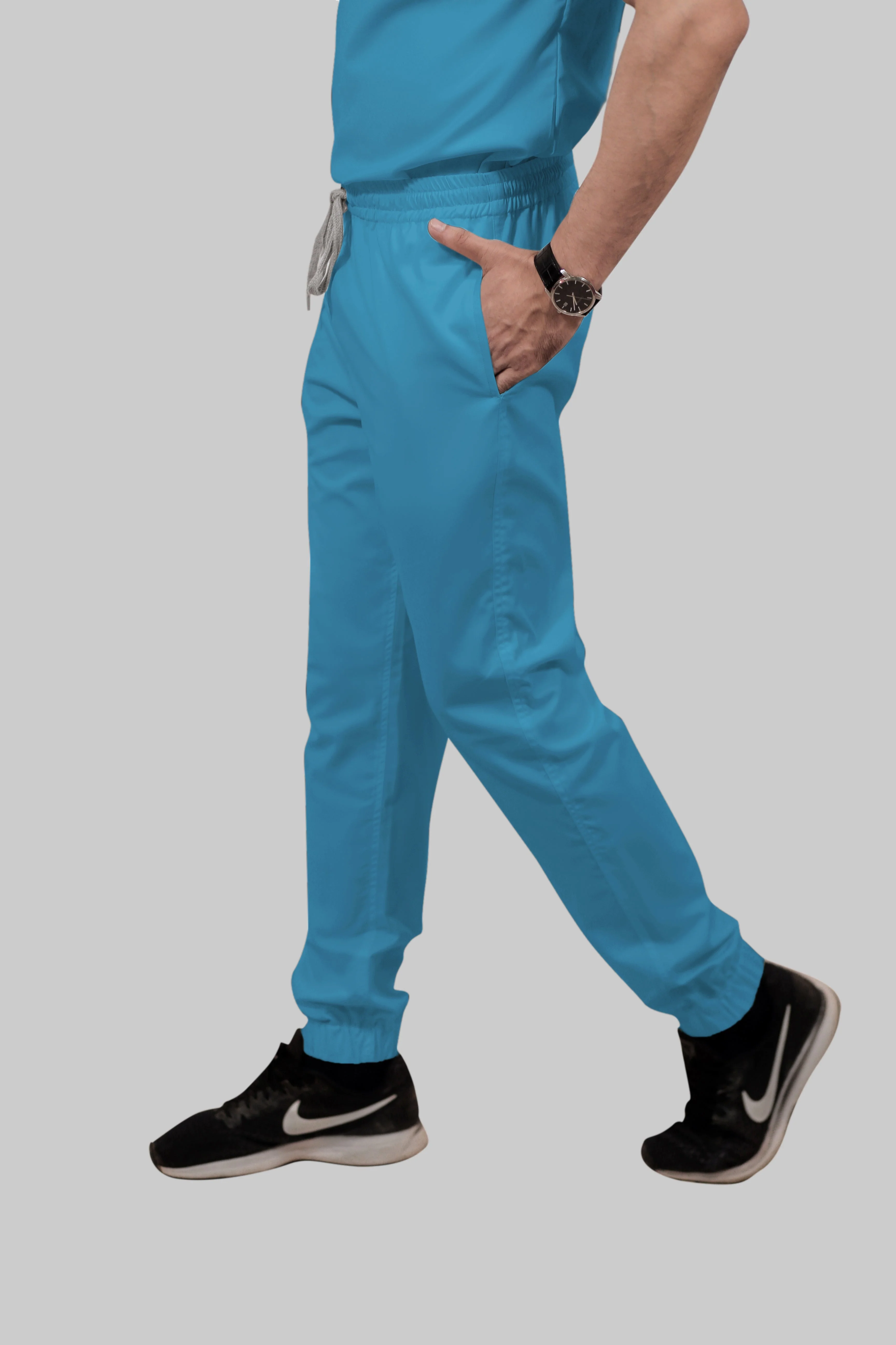 Stretchable (2Way) Women Peacock Blue V-Neck With Jogger Scrub Set - Image 4