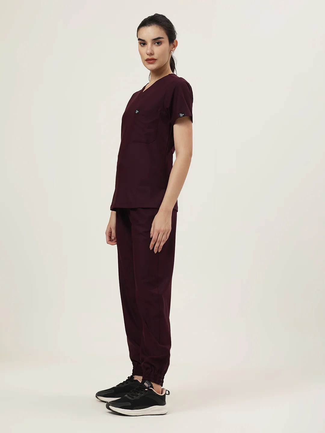Stretchable (4Way) Women Wine V-Neck With Jogger Scrub Set - Image 4